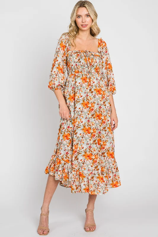 Light Blue Floral Ruffle Square Neck Smocked Front Tie Midi Dress Comfortable Sleeveless Midi Dress Light Blue Floral Ruffle Square Neck Smocked Front Tie Midi Dress Comfortable Sleeveless Midi Dress