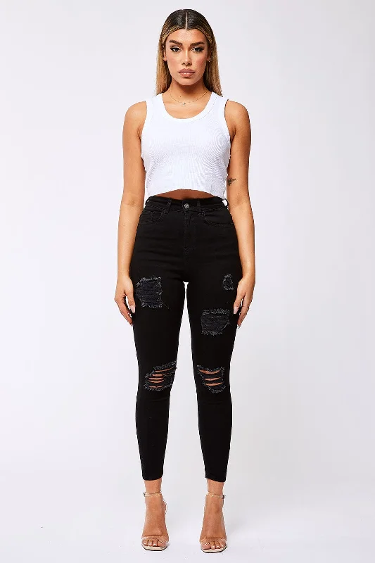 SKINNY JEANS RIPPED & REPAIRED - BLACK